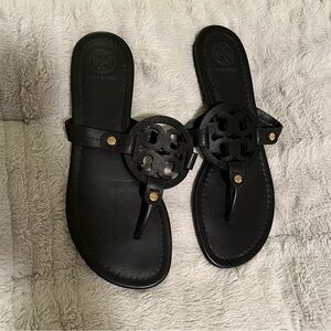 Tory Burch Black Sandals with Gold Accents